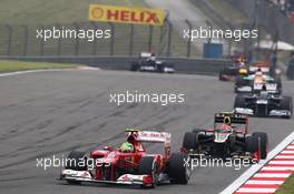 Felipe Massa (BRA) Ferrari F2012 leads Romain Grosjean (FRA) Lotus F1 E20. 15.04.2012. Formula 1 World Championship, Rd 3, Chinese Grand Prix, Shanghai, China, Race Day