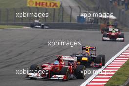 Fernando Alonso (ESP) Ferrari F2012 leads Mark Webber (AUS) Red Bull Racing RB8. 15.04.2012. Formula 1 World Championship, Rd 3, Chinese Grand Prix, Shanghai, China, Race Day