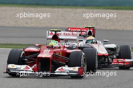 Felipe Massa (BRA) Ferrari F2012 leads Lewis Hamilton (GBR) McLaren MP4/27. 15.04.2012. Formula 1 World Championship, Rd 3, Chinese Grand Prix, Shanghai, China, Race Day