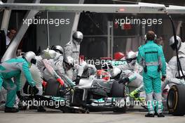 Michael Schumacher (GER) Mercedes AMG F1 W03 makes a pit stop that led to his retirement when a wheel was not securely attached to the car. 15.04.2012. Formula 1 World Championship, Rd 3, Chinese Grand Prix, Shanghai, China, Race Day