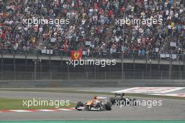 Nico Hulkenberg (GER) Sahara Force India F1 VJM05 leads Heikki Kovalainen (FIN) Caterham CT01. 15.04.2012. Formula 1 World Championship, Rd 3, Chinese Grand Prix, Shanghai, China, Race Day