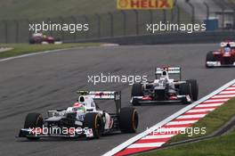 Sergio Perez (MEX) Sauber C31 leads team mate Kamui Kobayashi (JPN) Sauber C31. 15.04.2012. Formula 1 World Championship, Rd 3, Chinese Grand Prix, Shanghai, China, Race Day