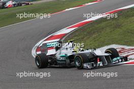 Race winner Nico Rosberg (GER) Mercedes AMG F1 W03 leads second placed Jenson Button (GBR) McLaren MP4/27. 15.04.2012. Formula 1 World Championship, Rd 3, Chinese Grand Prix, Shanghai, China, Race Day