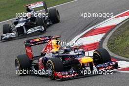 Sebastian Vettel (GER) Red Bull Racing RB8 leads Pastor Maldonado (VEN) Williams FW34. 15.04.2012. Formula 1 World Championship, Rd 3, Chinese Grand Prix, Shanghai, China, Race Day