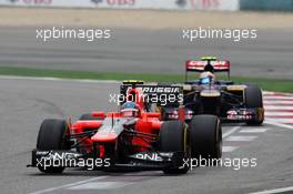 Charles Pic (FRA) Marussia F1 Team MR01 leads Jean-Eric Vergne (FRA) Scuderia Toro Rosso STR7. 15.04.2012. Formula 1 World Championship, Rd 3, Chinese Grand Prix, Shanghai, China, Race Day