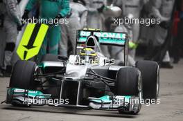 Race winner Nico Rosberg (GER) Mercedes AMG F1 W03 makes a pit stop. 15.04.2012. Formula 1 World Championship, Rd 3, Chinese Grand Prix, Shanghai, China, Race Day