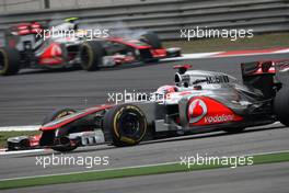 Jenson Button (GBR), McLaren Mercedes and Lewis Hamilton (GBR), McLaren Mercedes  15.04.2012. Formula 1 World Championship, Rd 3, Chinese Grand Prix, Shanghai, China, Race Day