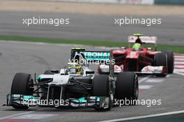 Nico Rosberg (GER) Mercedes AMG F1 W03 leads Felipe Massa (BRA) Ferrari F2012. 15.04.2012. Formula 1 World Championship, Rd 3, Chinese Grand Prix, Shanghai, China, Race Day