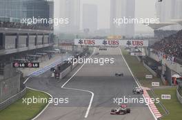 Lewis Hamilton (GBR) McLaren MP4/27 leads Sergio Perez (MEX) Sauber C31. 15.04.2012. Formula 1 World Championship, Rd 3, Chinese Grand Prix, Shanghai, China, Race Day