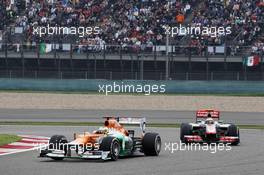 Paul di Resta (GBR) Sahara Force India VJM05 leads Lewis Hamilton (GBR) McLaren MP4/27. 15.04.2012. Formula 1 World Championship, Rd 3, Chinese Grand Prix, Shanghai, China, Race Day