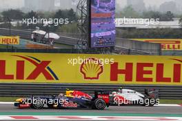 Mark Webber (AUS) Red Bull Racing RB8 battles with Lewis Hamilton (GBR) McLaren MP4/27. 15.04.2012. Formula 1 World Championship, Rd 3, Chinese Grand Prix, Shanghai, China, Race Day