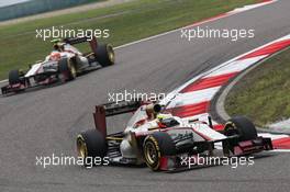 Pedro De La Rosa (ESP) HRT Formula 1 Team F112 leads team mate Narain Karthikeyan (IND) HRT Formula One Team HRT F112. 15.04.2012. Formula 1 World Championship, Rd 3, Chinese Grand Prix, Shanghai, China, Race Day