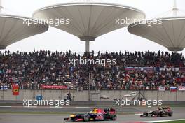 Sebastian Vettel (GER), Red Bull Racing and Romain Grosjean (FRA), Lotus F1 Team  15.04.2012. Formula 1 World Championship, Rd 3, Chinese Grand Prix, Shanghai, China, Race Day