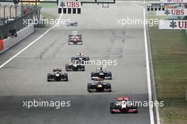 Lewis Hamilton (GBR) McLaren MP4/27 leads Sebastian Vettel (GER) Red Bull Racing RB8. 15.04.2012. Formula 1 World Championship, Rd 3, Chinese Grand Prix, Shanghai, China, Race Day