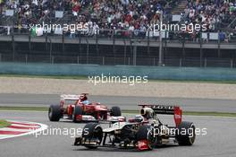 Kimi Raikkonen (FIN) Lotus E20 leads Fernando Alonso (ESP) Ferrari F2012. 15.04.2012. Formula 1 World Championship, Rd 3, Chinese Grand Prix, Shanghai, China, Race Day