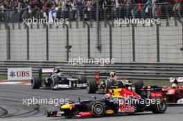 Mark Webber (AUS) Red Bull Racing RB8 leads Felipe Massa (BRA) Ferrari F2012 and Romain Grosjean (FRA) Lotus F1 E20 and Bruno Senna (BRA) Williams FW34. 15.04.2012. Formula 1 World Championship, Rd 3, Chinese Grand Prix, Shanghai, China, Race Day