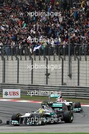 Race winner Nico Rosberg (GER) Mercedes AMG F1 W03 leads Michael Schumacher (GER) Mercedes AMG F1 W03. 15.04.2012. Formula 1 World Championship, Rd 3, Chinese Grand Prix, Shanghai, China, Race Day