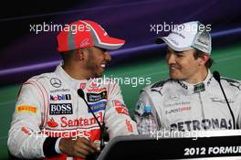 (L to R): Lewis Hamilton (GBR) McLaren with pole sitter Nico Rosberg (GER) Mercedes AMG F1 in the FIA Press Conference. 14.04.2012. Formula 1 World Championship, Rd 3, Chinese Grand Prix, Shanghai, China, Qualifying Day