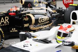 Sergio Perez (MEX) Sauber C31 and Romain Grosjean (FRA) Lotus F1 E20 in parc ferme. 14.04.2012. Formula 1 World Championship, Rd 3, Chinese Grand Prix, Shanghai, China, Qualifying Day