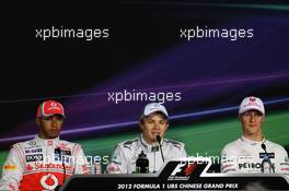 Qualifying top three in the FIA Press Conference (L to R): Lewis Hamilton (GBR) McLaren, second; Nico Rosberg (GER) Mercedes AMG F1, pole position; Michael Schumacher (GER) Mercedes AMG F1, third. 14.04.2012. Formula 1 World Championship, Rd 3, Chinese Grand Prix, Shanghai, China, Qualifying Day
