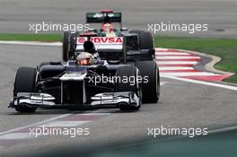 Pastor Maldonado (VEN) Williams FW34 leads Heikki Kovalainen (FIN) Caterham CT01. 14.04.2012. Formula 1 World Championship, Rd 3, Chinese Grand Prix, Shanghai, China, Qualifying Day