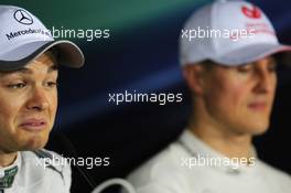 (L to R): Pole sitter Nico Rosberg (GER) Mercedes AMG F1 with team mate Michael Schumacher (GER) Mercedes AMG F1 in the FIA Press Conference. 14.04.2012. Formula 1 World Championship, Rd 3, Chinese Grand Prix, Shanghai, China, Qualifying Day