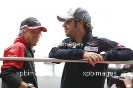 (L to R): Charles Pic (FRA) Marussia F1 Team with Jean-Eric Vergne (FRA) Scuderia Toro Rosso on the drivers parade. 15.04.2012. Formula 1 World Championship, Rd 3, Chinese Grand Prix, Shanghai, China, Race Day