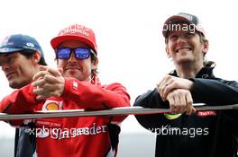 (L to R): Fernando Alonso (ESP) Ferrari with Romain Grosjean (FRA) Lotus F1 Team on the drivers parade. 15.04.2012. Formula 1 World Championship, Rd 3, Chinese Grand Prix, Shanghai, China, Race Day