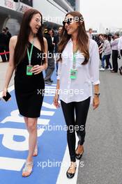 Jessica Michibata (JPN) (Right) with sister Angelica Michibata (JPN). 15.04.2012. Formula 1 World Championship, Rd 3, Chinese Grand Prix, Shanghai, China, Race Day