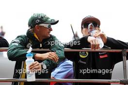 (L to R): Heikki Kovalainen (FIN) Caterham with Kimi Raikkonen (FIN) Lotus F1 Team on the drivers parade. 15.04.2012. Formula 1 World Championship, Rd 3, Chinese Grand Prix, Shanghai, China, Race Day