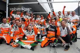 The Sahara Force India F1 Team mechanics celebrate winning the Sky Sports F1 trophy for the fastest pit stop at the Malaysian GP. 15.04.2012. Formula 1 World Championship, Rd 3, Chinese Grand Prix, Shanghai, China, Race Day