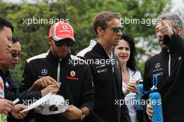 (L to R): Lewis Hamilton (GBR) McLaren with Jenson Button (GBR) McLaren. 15.04.2012. Formula 1 World Championship, Rd 3, Chinese Grand Prix, Shanghai, China, Race Day