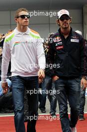 (L to R): Paul di Resta (GBR) Sahara Force India F1 with Jean-Eric Vergne (FRA) Scuderia Toro Rosso on the drivers parade. 15.04.2012. Formula 1 World Championship, Rd 3, Chinese Grand Prix, Shanghai, China, Race Day