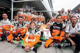 The Sahara Force India F1 Team mechanics celebrate winning the Sky Sports F1 trophy for the fastest pit stop at the Malaysian GP. 15.04.2012. Formula 1 World Championship, Rd 3, Chinese Grand Prix, Shanghai, China, Race Day