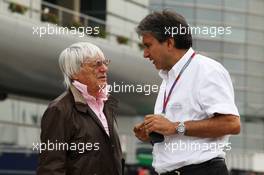 (L to R): Bernie Ecclestone (GBR) CEO Formula One Group (FOM) with Pasquale Lattuneddu (ITA) of the FOM. 12.04.2012. Formula 1 World Championship, Rd 3, Chinese Grand Prix, Shanghai, China, Preparation Day