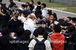 Nico Hulkenberg (GER) Sahara Force India F1 signs autographs for the fans. 12.04.2012. Formula 1 World Championship, Rd 3, Chinese Grand Prix, Shanghai, China, Preparation Day
