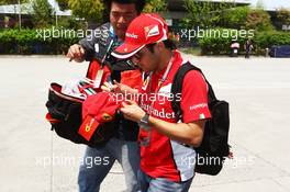 Felipe Massa (BRA) Ferrari signs autographs for the fans. 12.04.2012. Formula 1 World Championship, Rd 3, Chinese Grand Prix, Shanghai, China, Preparation Day