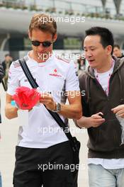 Jenson Button (GBR) McLaren signs autographs for the fans. 12.04.2012. Formula 1 World Championship, Rd 3, Chinese Grand Prix, Shanghai, China, Preparation Day