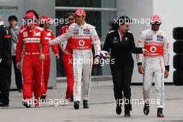 (L to R): Fernando Alonso (ESP) Ferrari; Jenson Button (GBR) McLaren and Lewis Hamilton (GBR) McLaren. 12.04.2012. Formula 1 World Championship, Rd 3, Chinese Grand Prix, Shanghai, China, Preparation Day