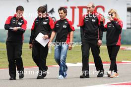 Timo Glock (GER) Marussia F1 Team walks the circuit with Maria De Villota (ESP) Marussia F1 Team Test Driver (Right). 12.04.2012. Formula 1 World Championship, Rd 3, Chinese Grand Prix, Shanghai, China, Preparation Day
