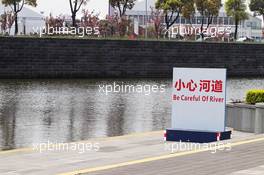 Sign warning to be careful of the river. 12.04.2012. Formula 1 World Championship, Rd 3, Chinese Grand Prix, Shanghai, China, Preparation Day