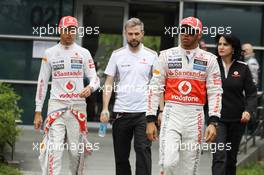 (L to R): Jenson Button (GBR) McLaren and team mate Lewis Hamilton (GBR) McLaren. 12.04.2012. Formula 1 World Championship, Rd 3, Chinese Grand Prix, Shanghai, China, Preparation Day