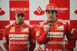 (L to R): Felipe Massa (BRA) Ferrari with team mate Fernando Alonso (ESP) Ferrari at a Santander Press Call. 12.04.2012. Formula 1 World Championship, Rd 3, Chinese Grand Prix, Shanghai, China, Preparation Day