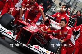 Ferrari F2012 pushed to scrutineering by mechanics. 12.04.2012. Formula 1 World Championship, Rd 3, Chinese Grand Prix, Shanghai, China, Preparation Day