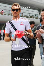 Jenson Button (GBR) McLaren signs autographs for the fans. 12.04.2012. Formula 1 World Championship, Rd 3, Chinese Grand Prix, Shanghai, China, Preparation Day
