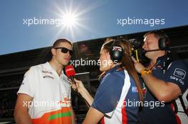 Paul di Resta (GBR) Sahara Force India F1 with Natalie Pinkham (GBR) Sky Sports Pitlane Reporter. 11.05.2012. Formula 1 World Championship, Rd 5, Spanish Grand Prix, Barcelona, Spain, Practice Day