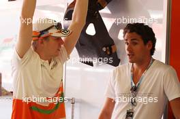 (L to R): Nico Hulkenberg (GER) Sahara Force India F1 with Adrian Sutil (GER) in the Sahara Force India F1 Team garage. 11.05.2012. Formula 1 World Championship, Rd 5, Spanish Grand Prix, Barcelona, Spain, Practice Day