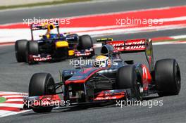 Lewis Hamilton (GBR) McLaren MP4/27 leads Sebastian Vettel (GER) Red Bull Racing RB8. 11.05.2012. Formula 1 World Championship, Rd 5, Spanish Grand Prix, Barcelona, Spain, Practice Day
