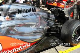 Lewis Hamilton (GBR) McLaren MP4/27 rear exhaust and rear suspension detail. 11.05.2012. Formula 1 World Championship, Rd 5, Spanish Grand Prix, Barcelona, Spain, Practice Day