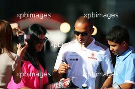 Lewis Hamilton (GBR) McLaren signs autographs for the fans. 11.05.2012. Formula 1 World Championship, Rd 5, Spanish Grand Prix, Barcelona, Spain, Practice Day